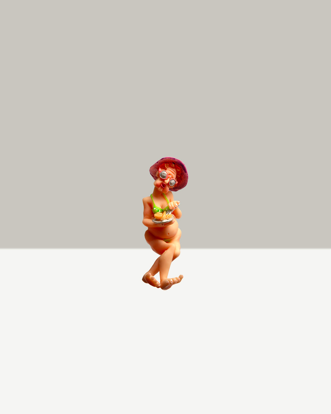 Sunbathing Grandma Figurine